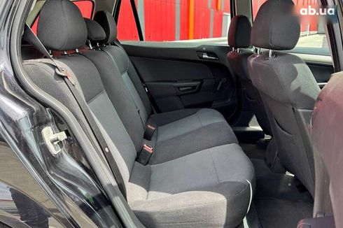 Opel Astra 2007 - фото 11