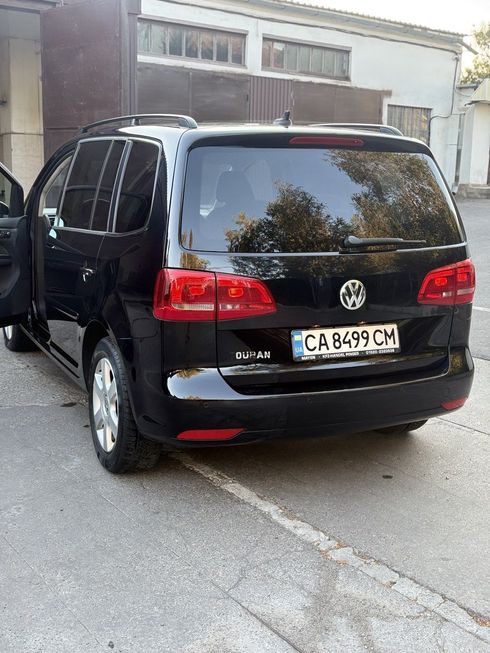 Volkswagen Touran 2010 черный - фото 7