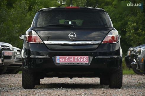 Opel Astra 2009 - фото 10