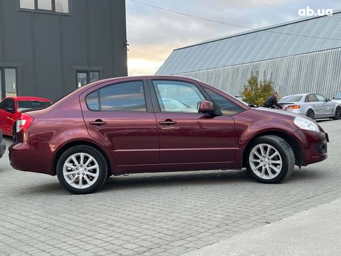Suzuki SX4 2010 красный - фото 8