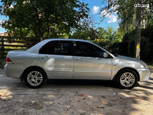 Mitsubishi Lancer 2005 серый - фото 11