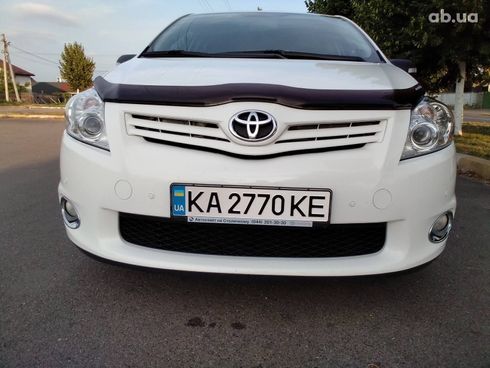 Toyota Auris 2012 белый - фото 6