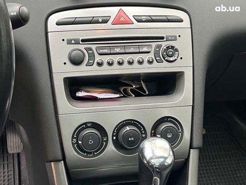 Peugeot 308 2011 черный - фото 27