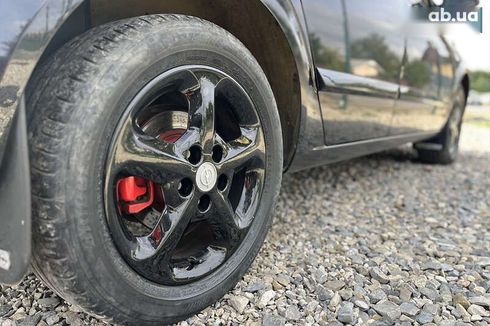 Opel Astra 2010 - фото 8