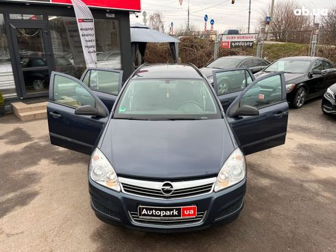 Opel Astra 2009 синий - фото 16