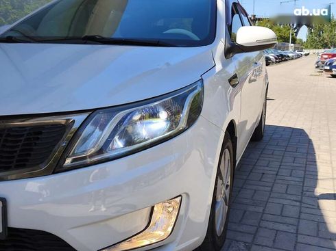 Kia Rio 2012 - фото 8
