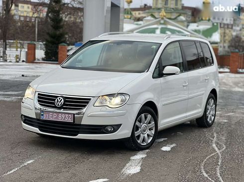 Volkswagen Touran 2010 - фото 4