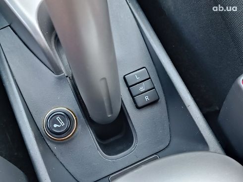 Toyota Auris 2007 красный - фото 29