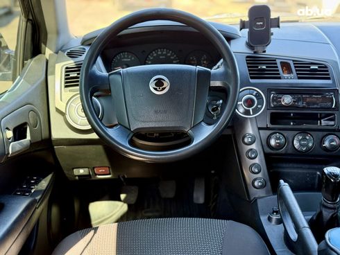 SsangYong Kyron 2010 черный - фото 13