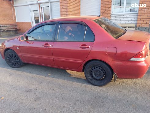 Mitsubishi Lancer 2005 красный - фото 11