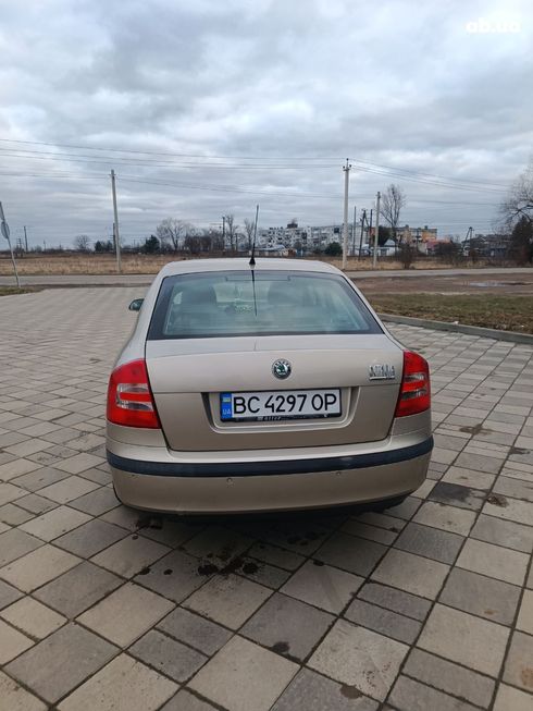 Skoda Octavia 2004 желтый - фото 3