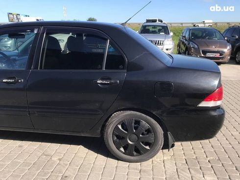 Mitsubishi Lancer 2008 черный - фото 14