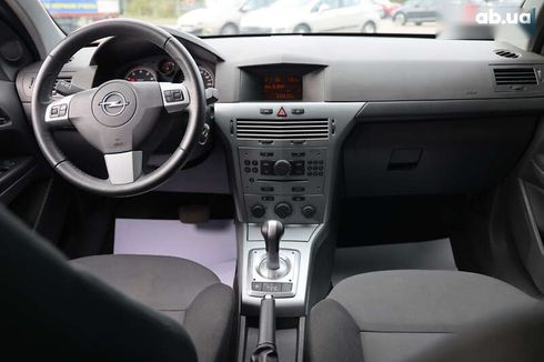 Opel Astra 2013 - фото 12