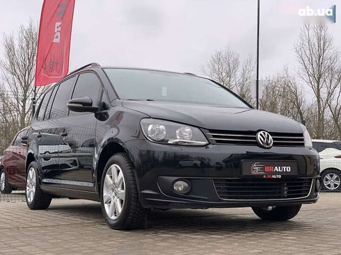 Volkswagen Touran 2011 - фото 11
