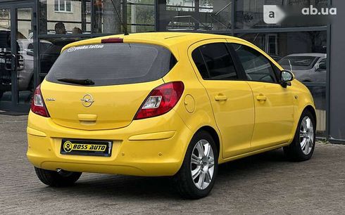 Opel Corsa 2011 - фото 6