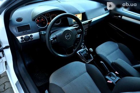 Opel Astra 2010 - фото 27