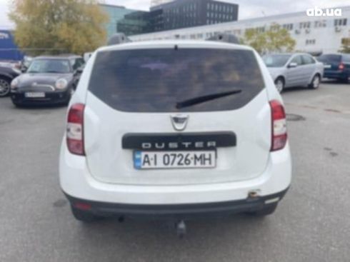 Dacia Duster 2015 белый - фото 2