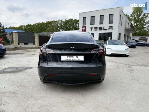 Tesla Model Y 2024 - фото 15