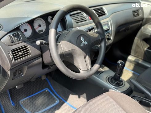 Mitsubishi Lancer 2006 синий - фото 21