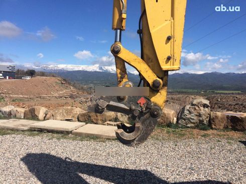 Komatsu WB 2007 - фото 14