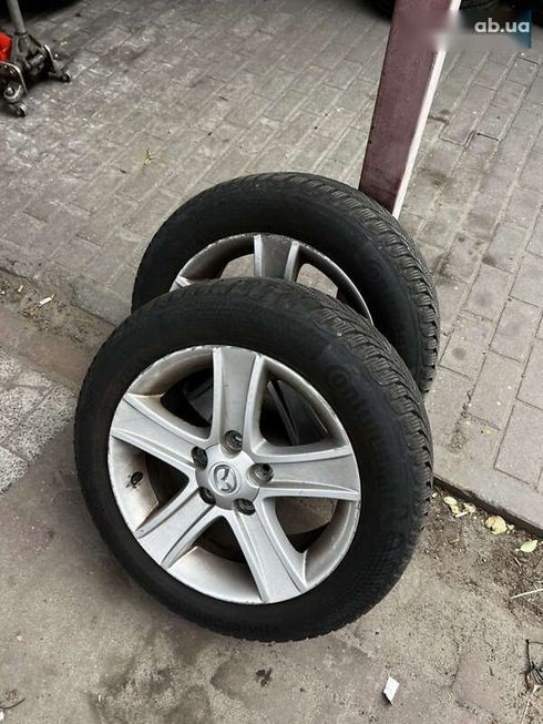 Mazda 6 2008 - фото 16