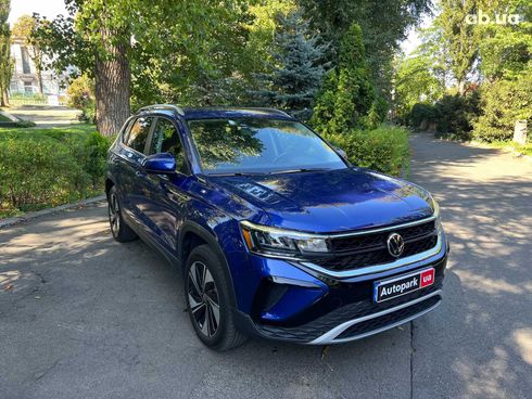 Volkswagen Taos 2023 синий - фото 3