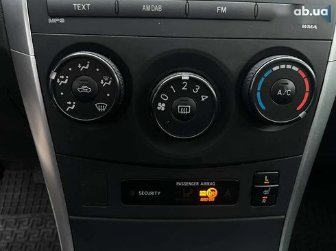 Toyota Corolla 2010 - фото 21