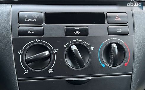 Toyota Corolla 2006 - фото 13