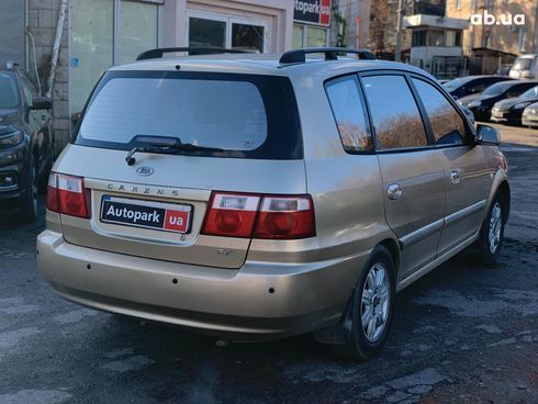 Kia Carens 2003 бежевый - фото 5
