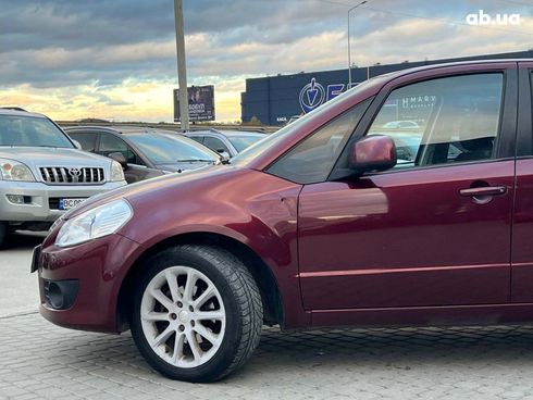 Suzuki SX4 2010 красный - фото 2