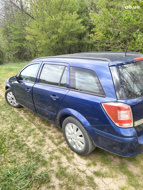 Opel Astra 2006 синий - фото 16