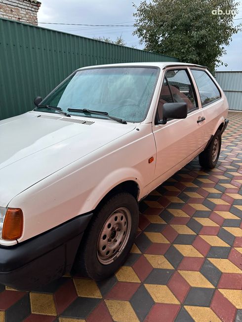 Volkswagen Polo 1994 белый - фото 3