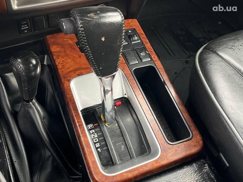 Nissan Patrol 2009 серый - фото 111