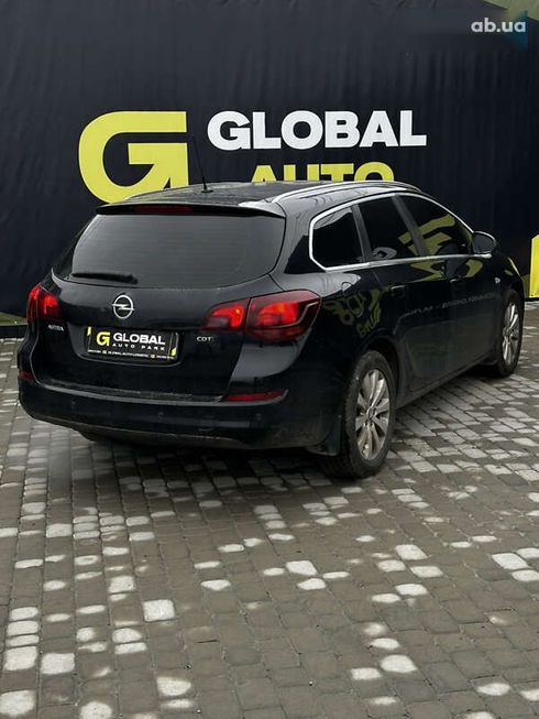 Opel Astra 2011 - фото 16