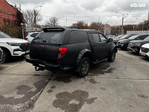 Mitsubishi l 200 2009 черный - фото 6