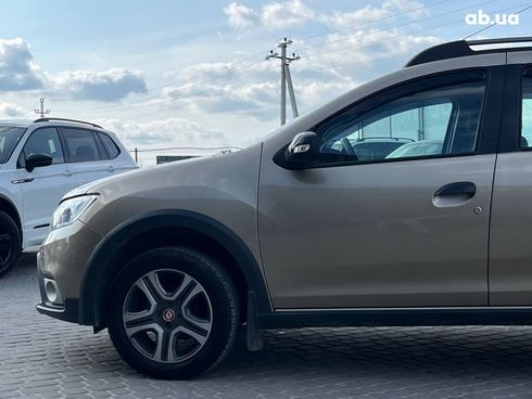 Renault Sandero 2019 бежевый - фото 26