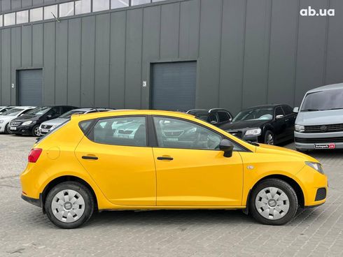 SEAT Ibiza 2011 желтый - фото 5