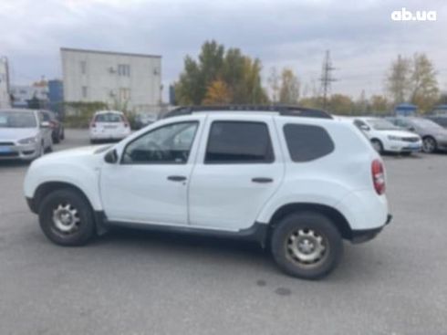 Dacia Duster 2015 белый - фото 4