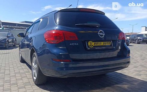 Opel Astra 2011 - фото 5