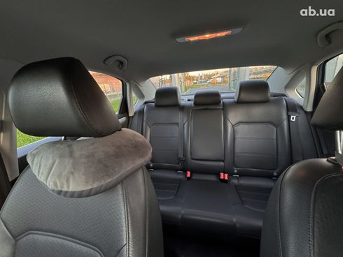 Volkswagen Passat 2012 голубой - фото 10