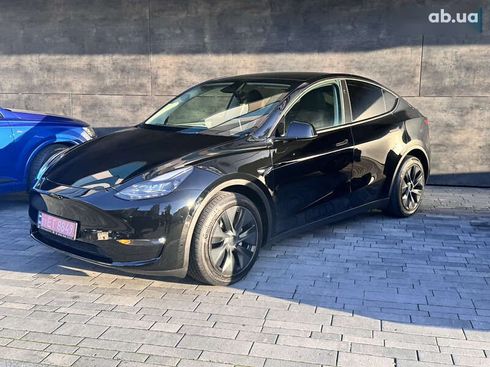 Tesla Model Y 2024 - фото 23