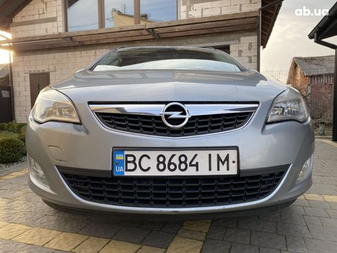 Opel Astra J 2011 серый - фото 10