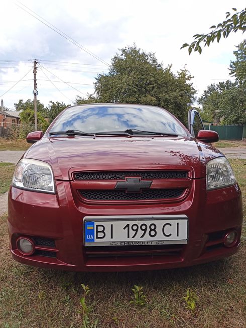 Chevrolet Aveo 2008 вишневый - фото 3