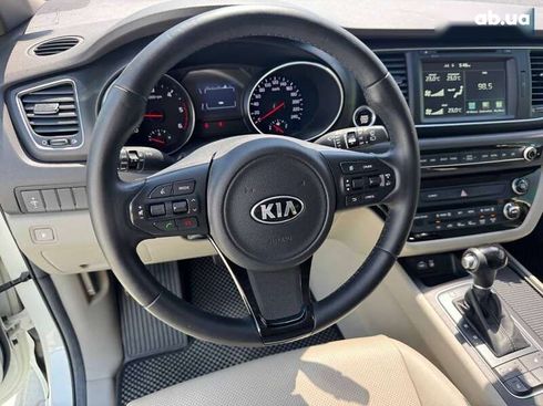 Kia Carnival 2014 - фото 11