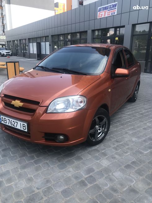 Chevrolet Aveo 2008 оранжевый - фото 8