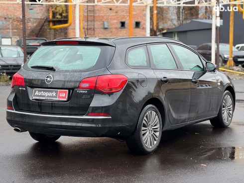 Opel Astra 2013 черный - фото 9