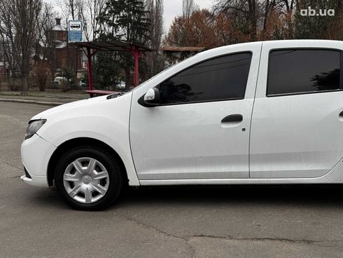 Renault Logan 2015 белый - фото 11