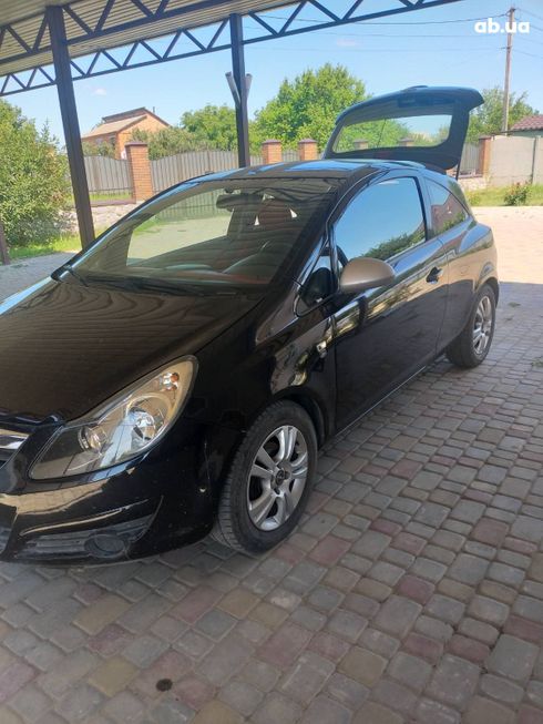 Opel Corsa 2011 черный - фото 6