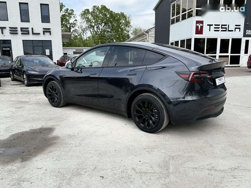 Tesla Model Y 2024 - фото 21