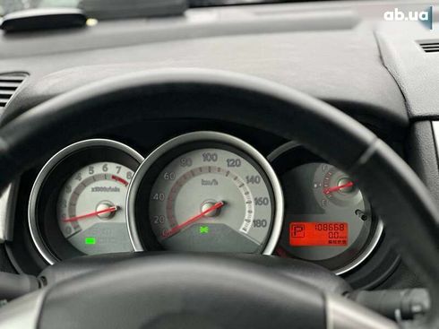 Nissan Tiida 2012 - фото 20